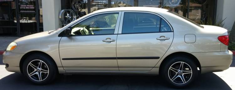 2005 Toyota Corolla on 15 in. White Diamond 253